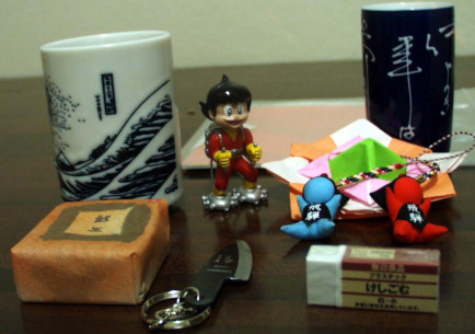 group of objects, including two tea-cups
and a Muji eraser Japan 2011 souvenirs