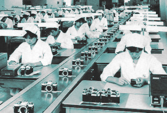 Osaka camera factory women on a camera assembly line